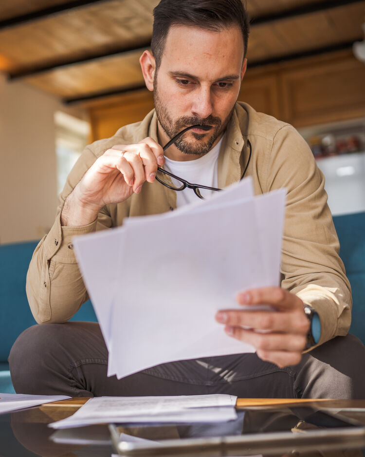 Man Reading Document